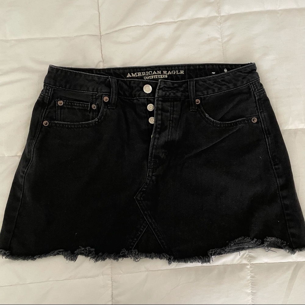Black denim mini skirt